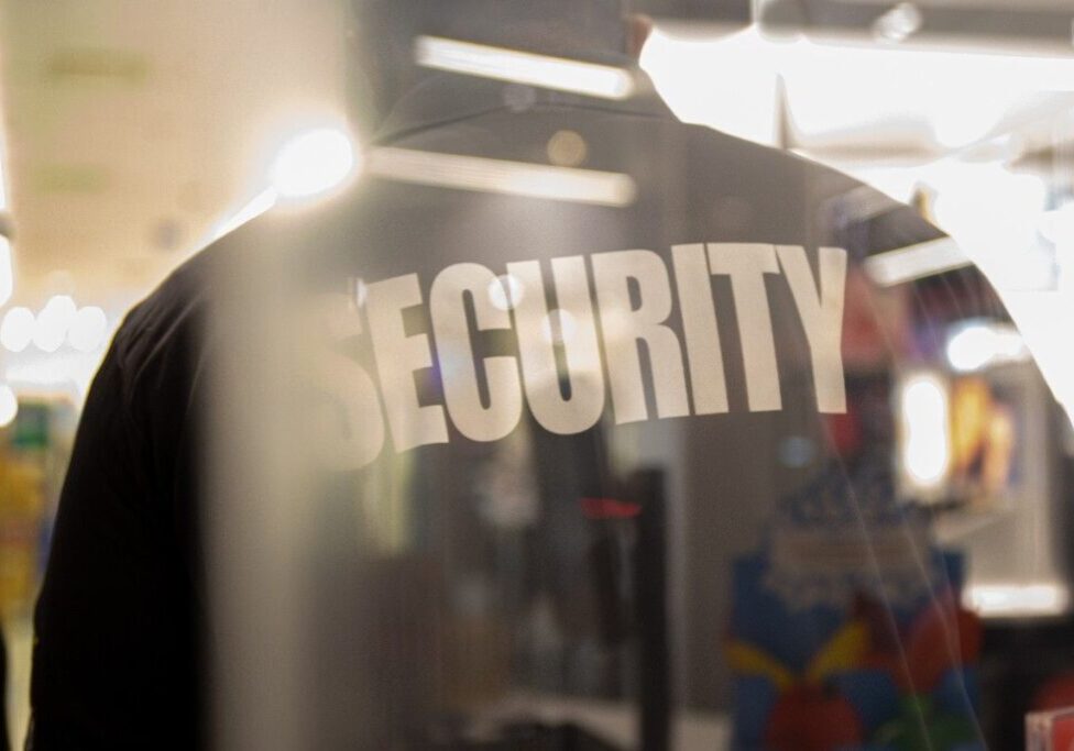 security-guard-standing-inside-commercial-building-2026-03-09-02-59-21-utc (1)