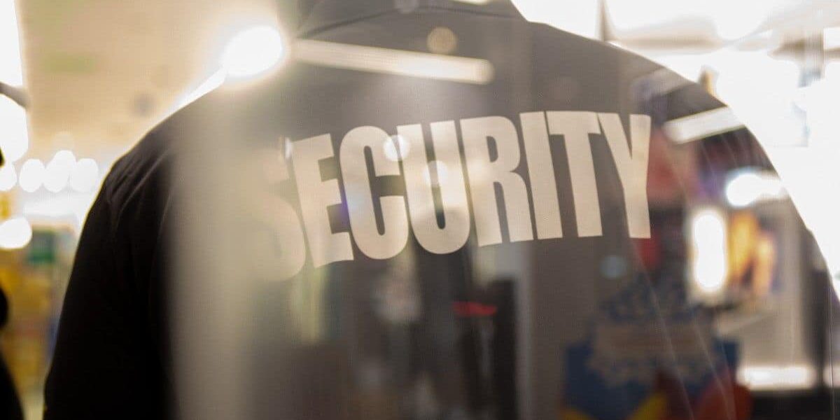 security-guard-standing-inside-commercial-building-2026-03-09-02-59-21-utc (1)